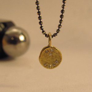 Sterling silver oxidized gold diamonds necklace.